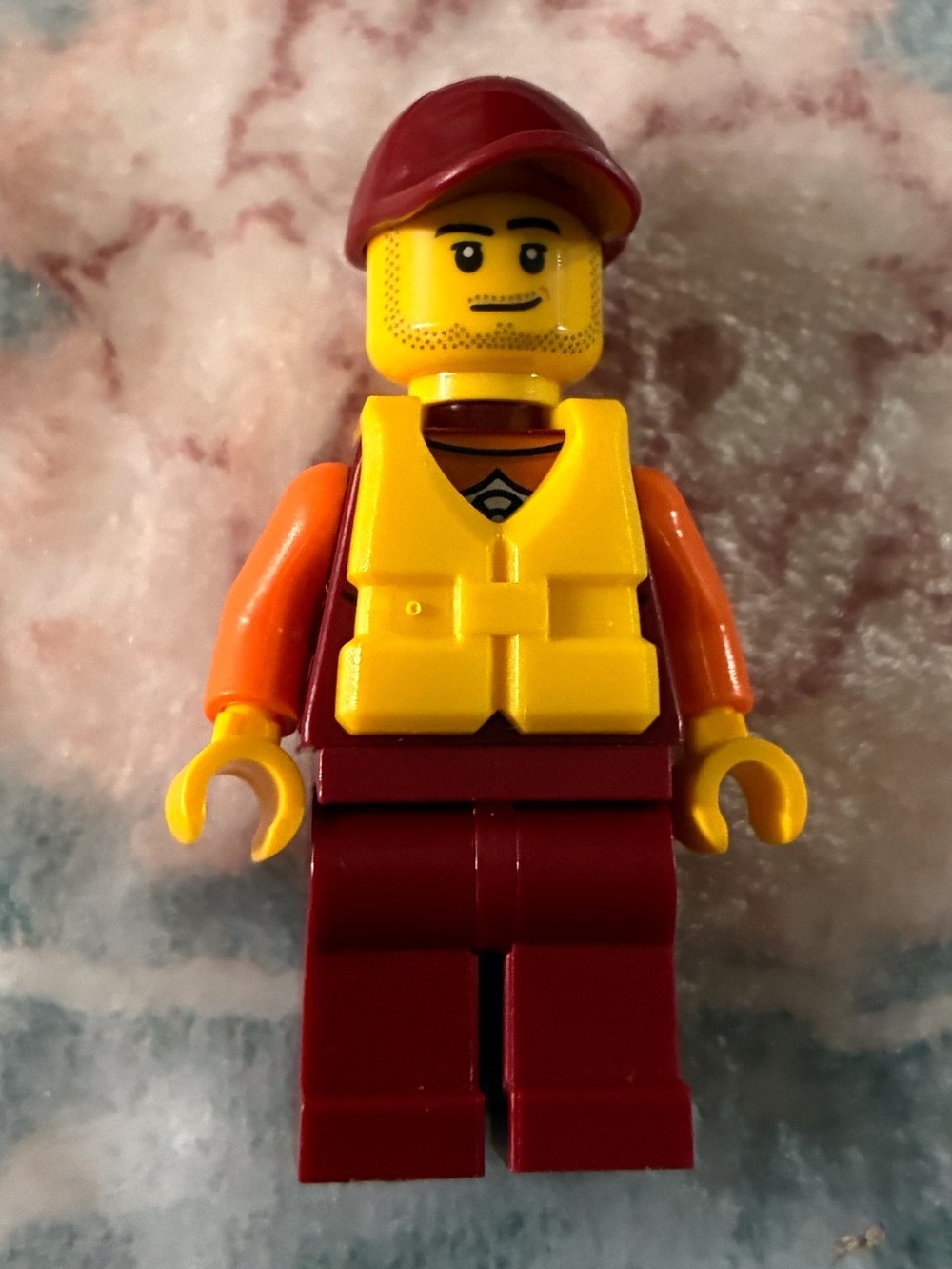 Lego Yellow Life Vest Minifigure with Red Cap and Maroon Legs